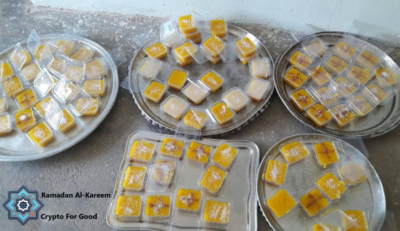 Ramadan Iftar packages of sweet dishes and appetizers, ready for distribution to those in need, facilitated by crypto donations via USDT.