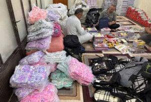 Muslim volunteers prepare school supplies, including backpacks and books, for 200 orphans. Crypto donations, like BTC, enable this educational support in six countries.