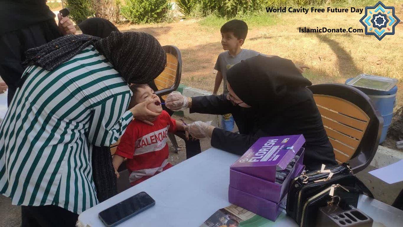 Children receiving dental care and education for World Cavity-Free Future Day, supported by crypto donations like BTC.