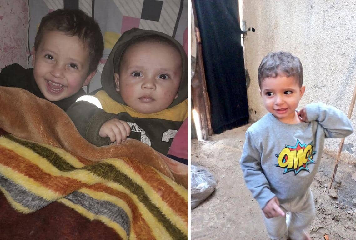 Children in Gaza sharing warmth under blankets, one smiling, another looking on, while a third child stands outside in a modest grey sweatshirt. Highlighting the urgent need for humanitarian aid and crypto donations to combat the winter crisis.