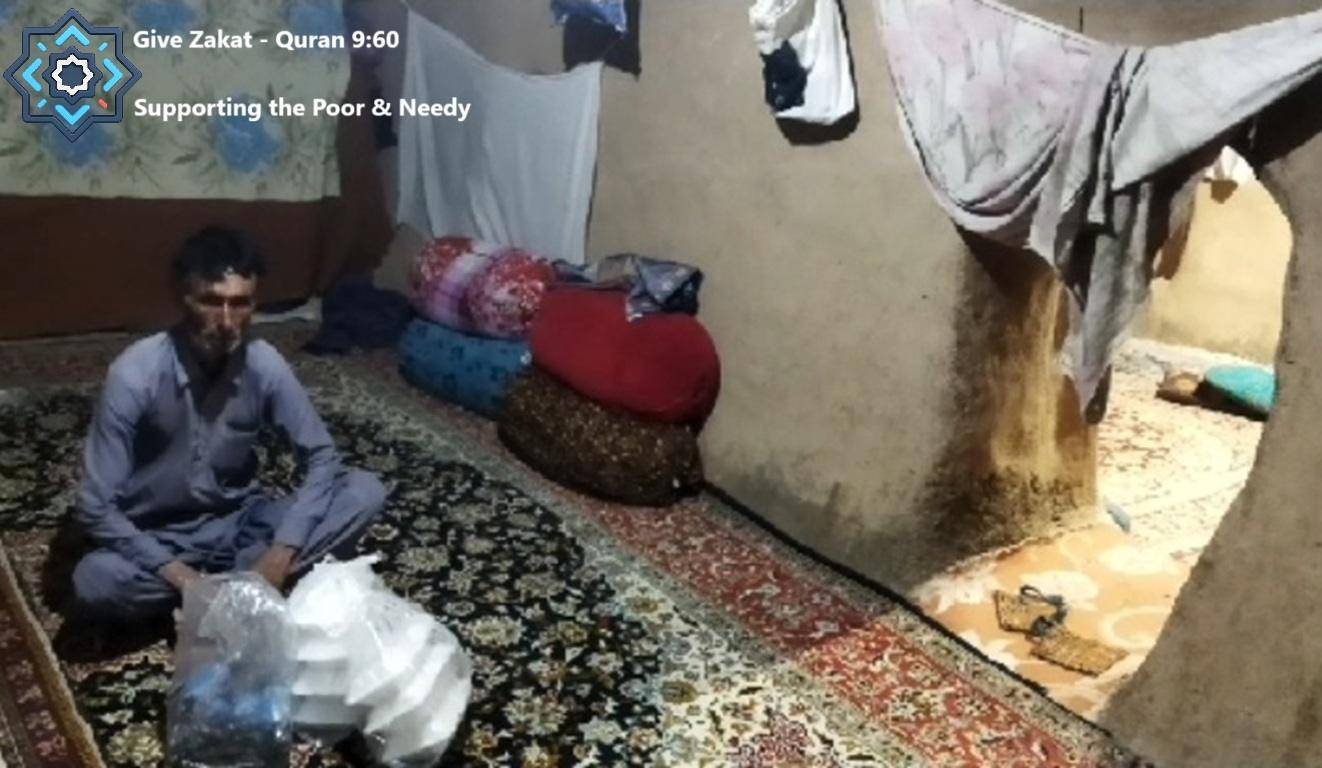 Man receiving food aid, symbolizing crypto zakat donation supporting the poor and needy, with Ethereum support.