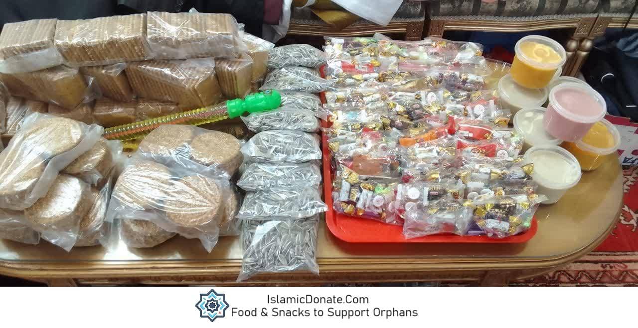 Bundles of biscuits and bags of snacks and packaged treats, including sunflower seeds, food and snacks are prepared to support orphans with crypto donations, potentially paid with XRP.