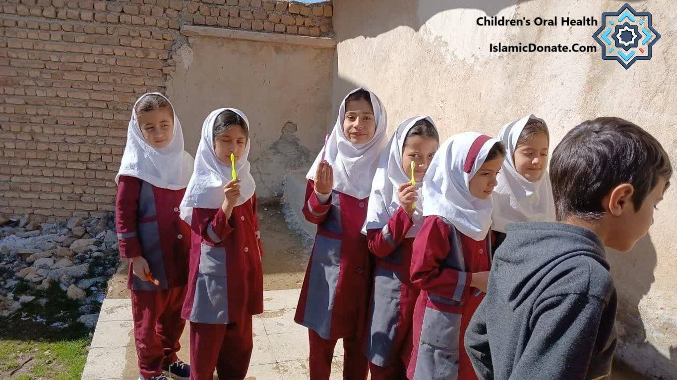 Children learning about oral hygiene, brushing teeth, supported by crypto donations in ETH. World Cavity-Free Future Day initiative.