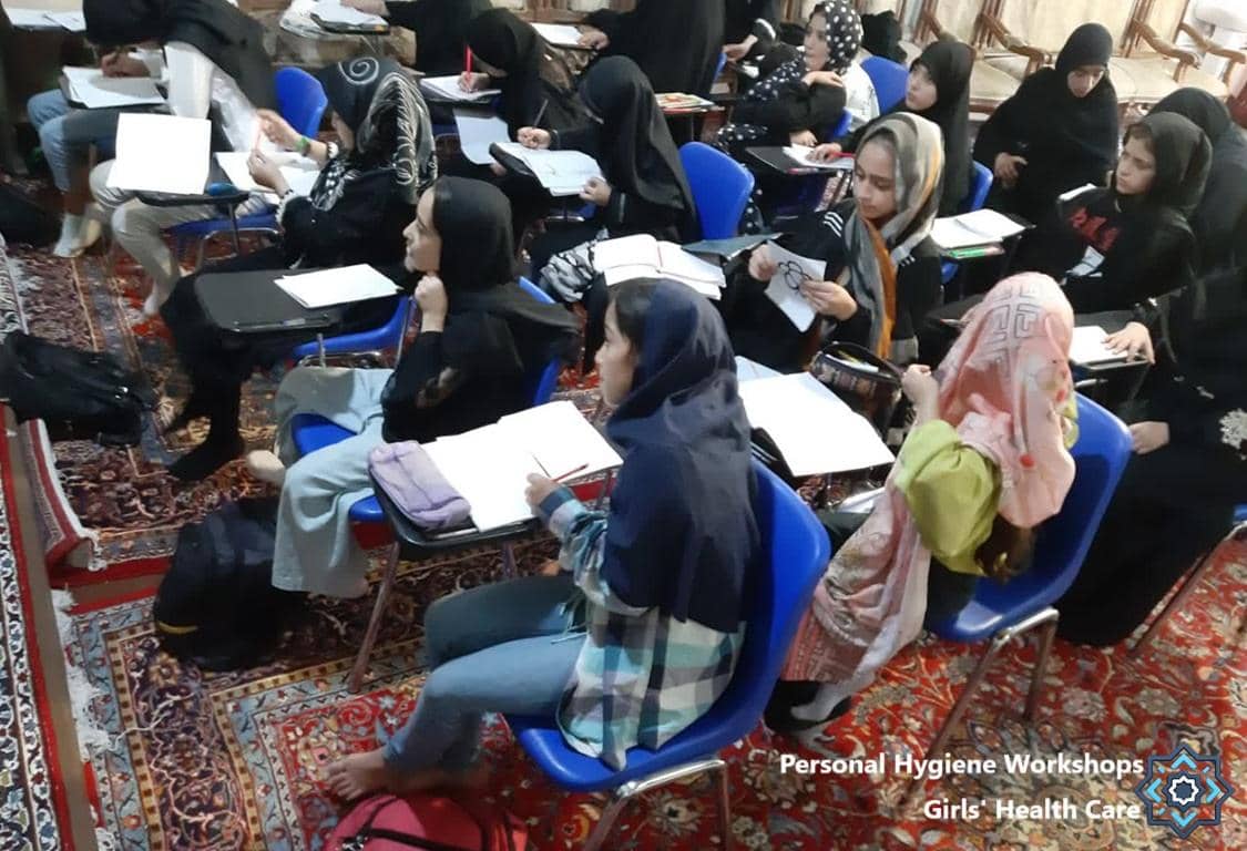 Girls attending a personal hygiene workshop hosted by Islamic Donate Charity, learning about health care and supported by anonymous crypto donations like Bitcoin for global giving.