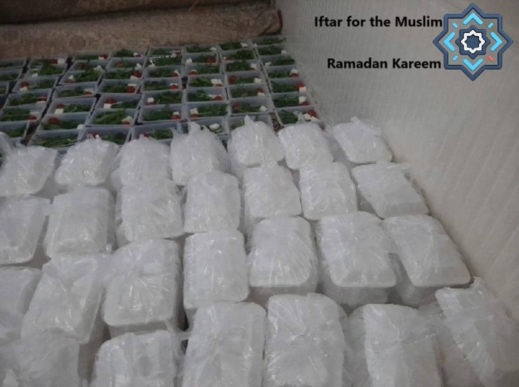 Rows of bagged food containers, prepared for Iftar during Ramadan Kareem, awaiting distribution. This image represents charitable giving, with donations supported by Bitcoin, enabling swift and secure aid to those in need across Africa and Asia.