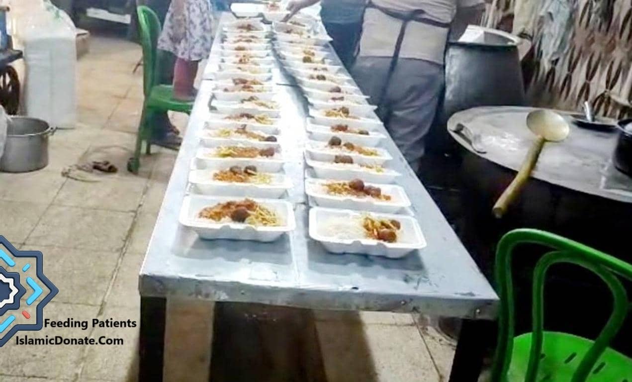 Rows of food containers being prepared for distribution, with a large pot and ladle visible, symbolizing community aid facilitated by ETH.