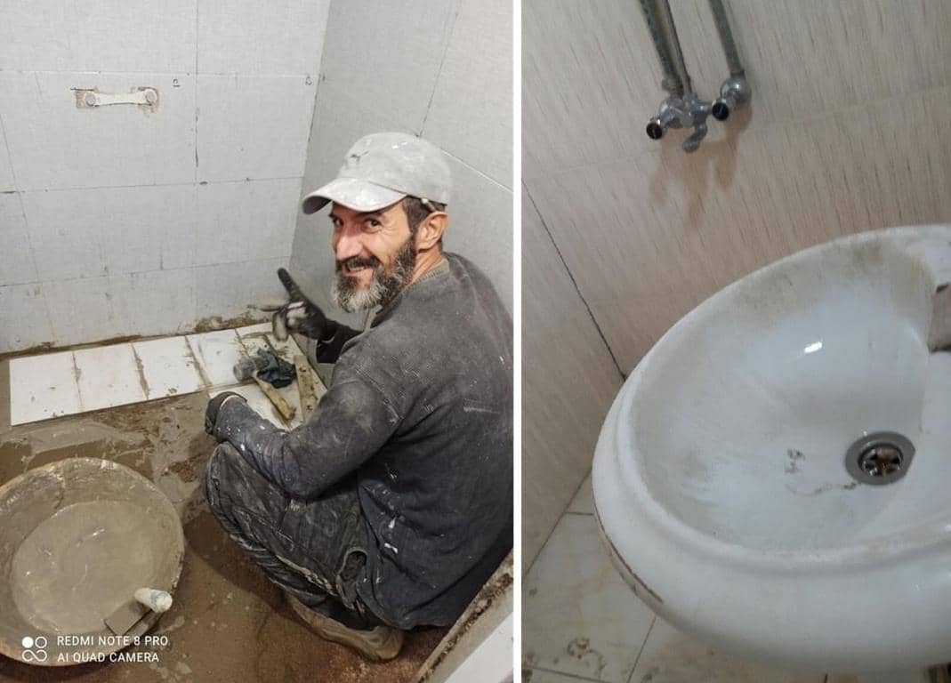 Tiler working on a bathroom renovation project, empowered by crypto donations via BNB, creating dignified work and steady income through job training.