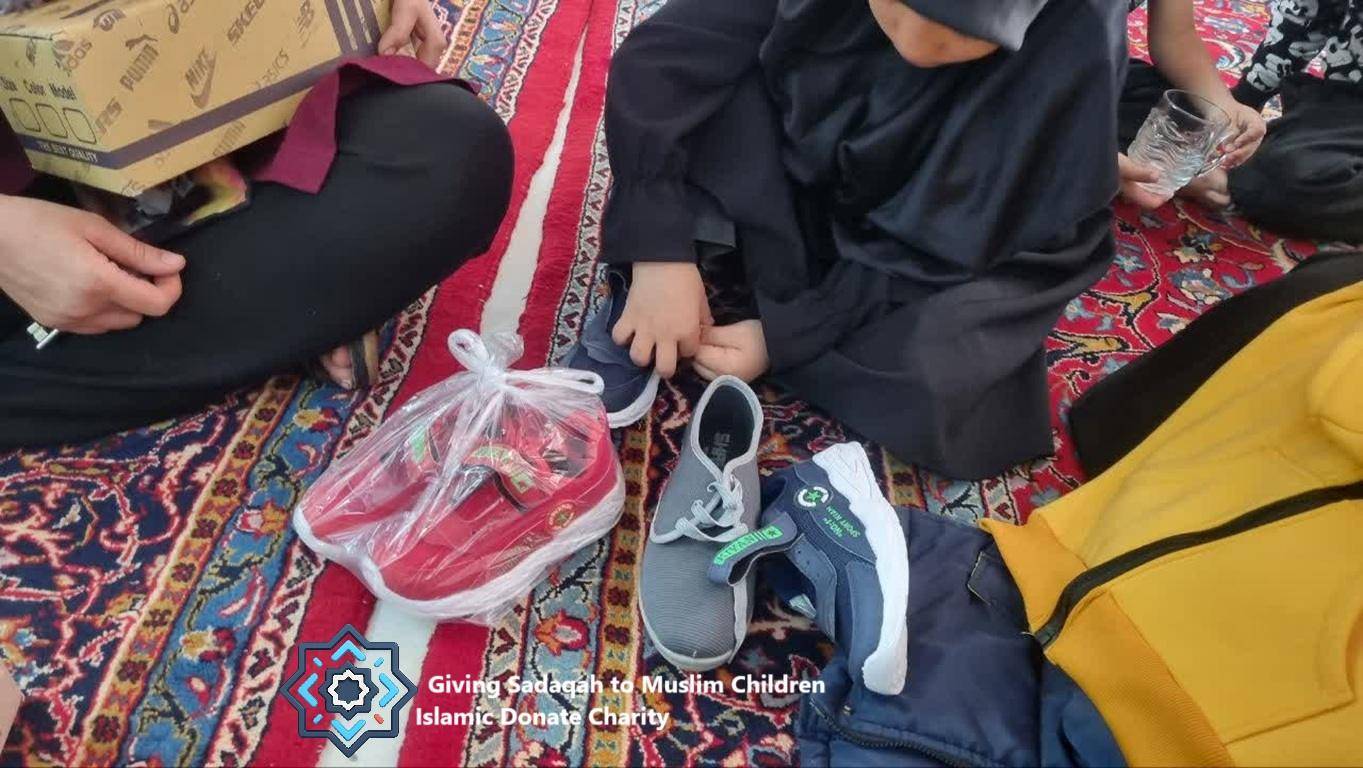 Children receiving shoes and clothing, a scene of humanitarian aid supported by crypto donations via Ethereum, embodying gratitude and relief for the Muslim Ummah.