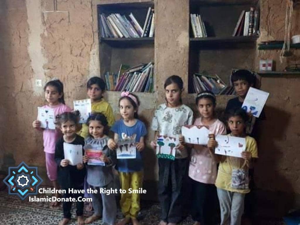 Children proudly display artwork, benefitting from crypto Khums donations via BTC for education and upliftment.