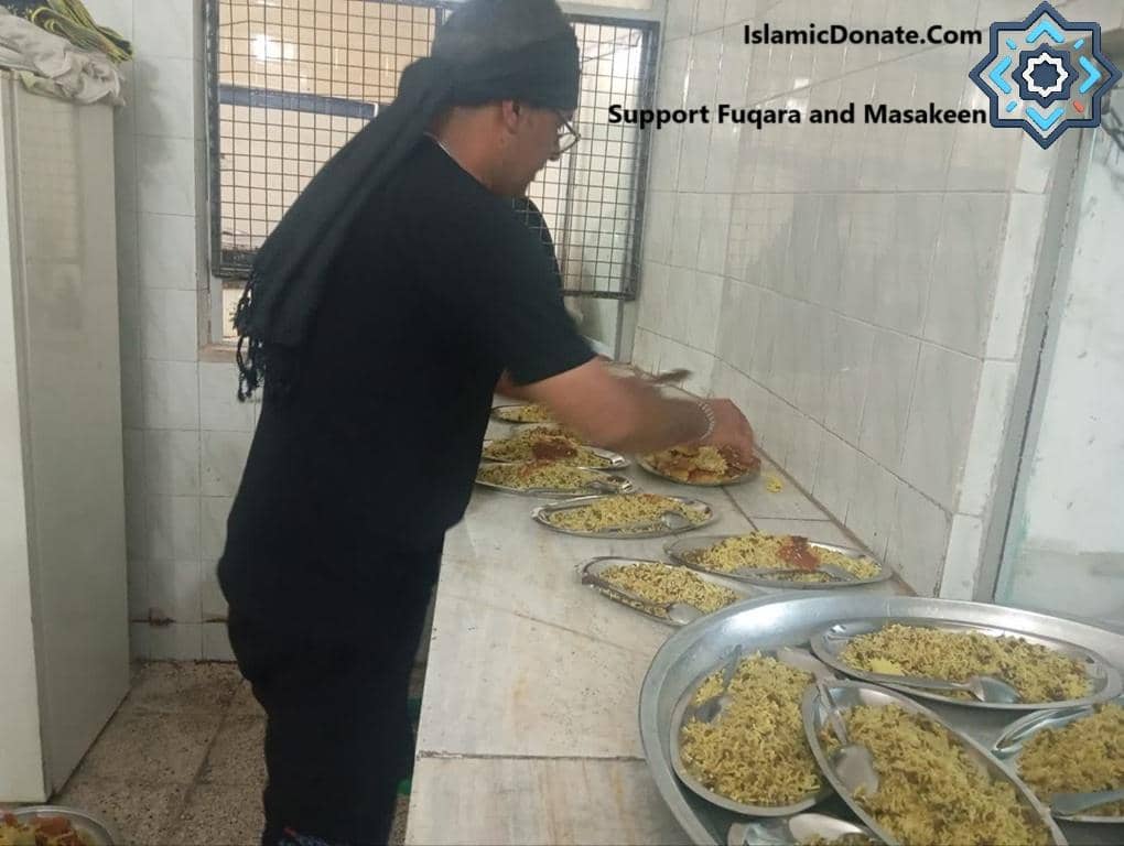 A person serving food onto plates, fulfilling kaffarah obligations via cryptocurrency with ETH, supporting the poor and hungry.