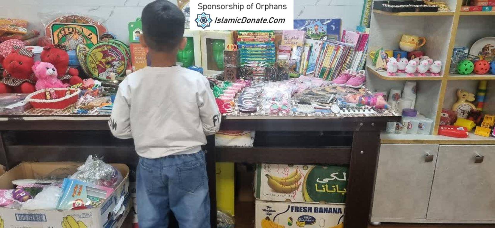 Child views table filled with toys and school supplies, crypto Khums donations for sponsored orphans and needy children. Supported by USDC.