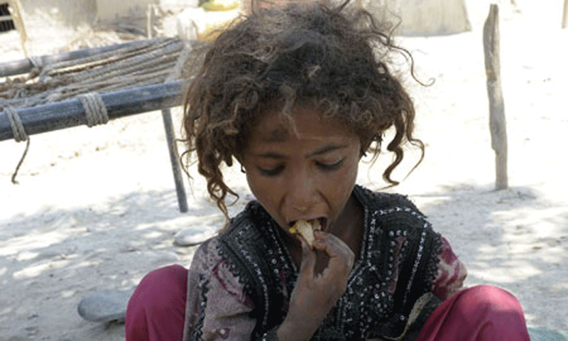 Child eating, implying aid is processed via USDT for humanitarian relief.