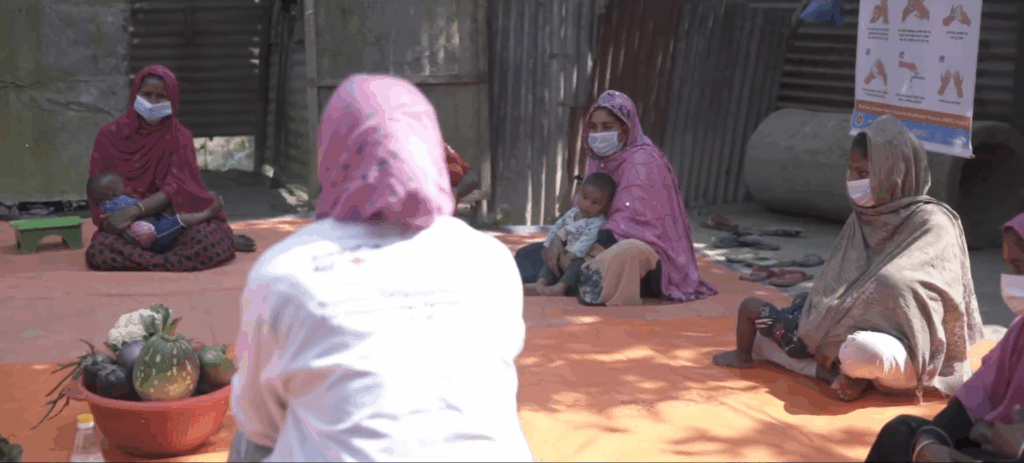 Women attend a healthcare and self-care workshop, receiving health education and aid, supported by crypto donations like ETH.