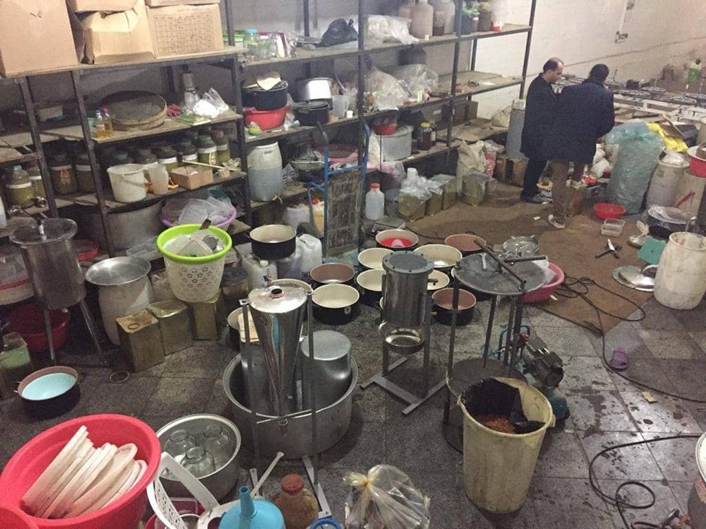 Aid distribution point with shelves of supplies and containers, featuring kitchenware and sanitation items for displaced families in Palestine, with support from crypto donations like Ethereum.