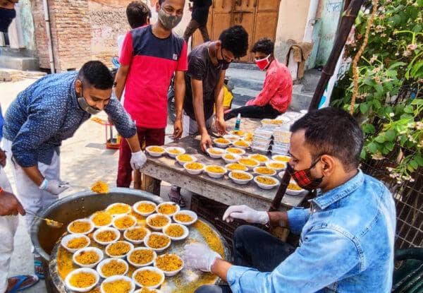 Volunteers distribute hot meals and raw meat packages of food during Eid al-Adha 2024, supported by ETH donations, to vulnerable communities in Afghanistan, Ethiopia, Somalia, and Yemen, including Palestine and Syria.