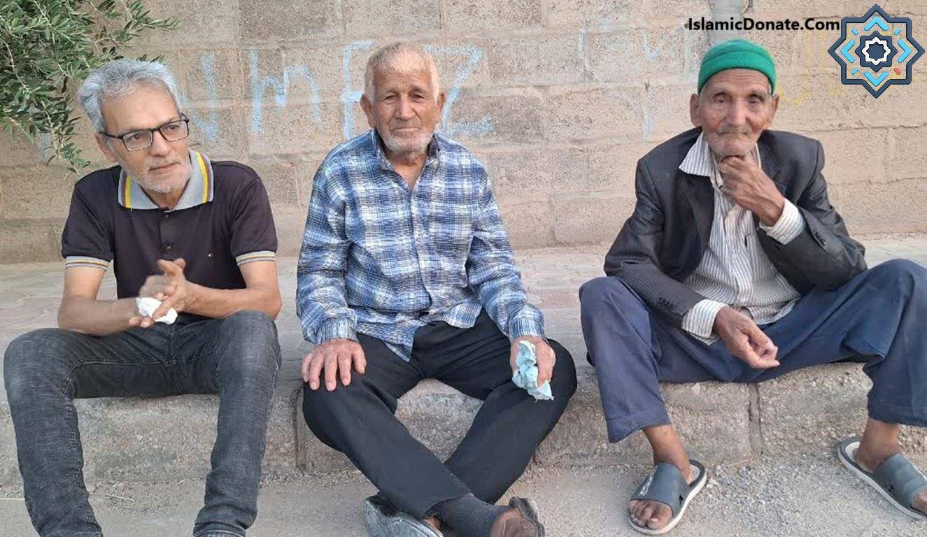 Three elderly Muslim men sitting outdoors, representing those who benefit from fidya donations for missed Ramadan fasts, aided by crypto like ETH.