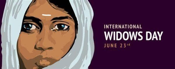 International Widows Day banner with artwork of a woman in a headscarf and text on a purple background. Keywords: Widows Day, building strength, community, solidarity, support widows. Supported by crypto donation via RLUSD.