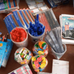 Back to school supplies donated via Ripple (XRP) for 200 orphans, including notebooks, pens, and pencils, enabling education in disadvantaged communities.
