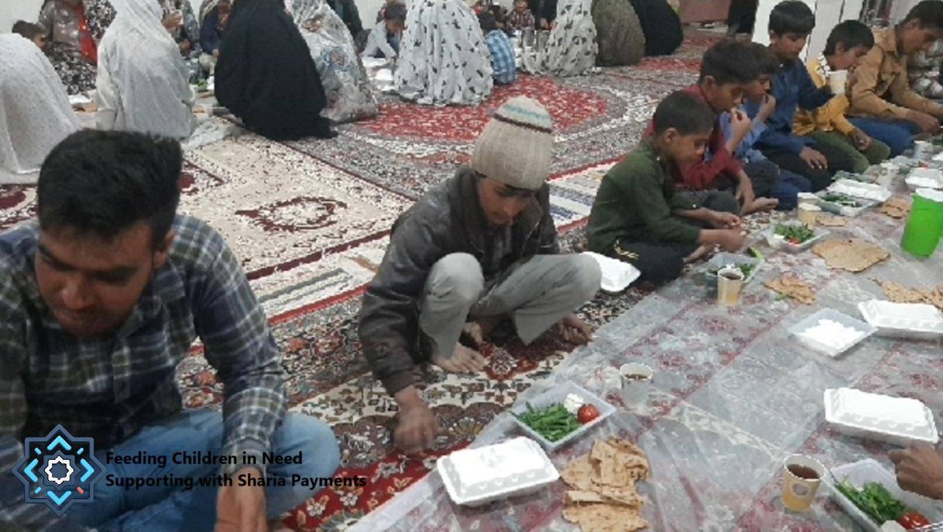 Children and adults gather on a carpet to share a meal, with food served in disposable containers. The scene depicts a communal Iftar, supported by crypto donations, providing relief to the needy. Festive Muslim gathering for iftar.