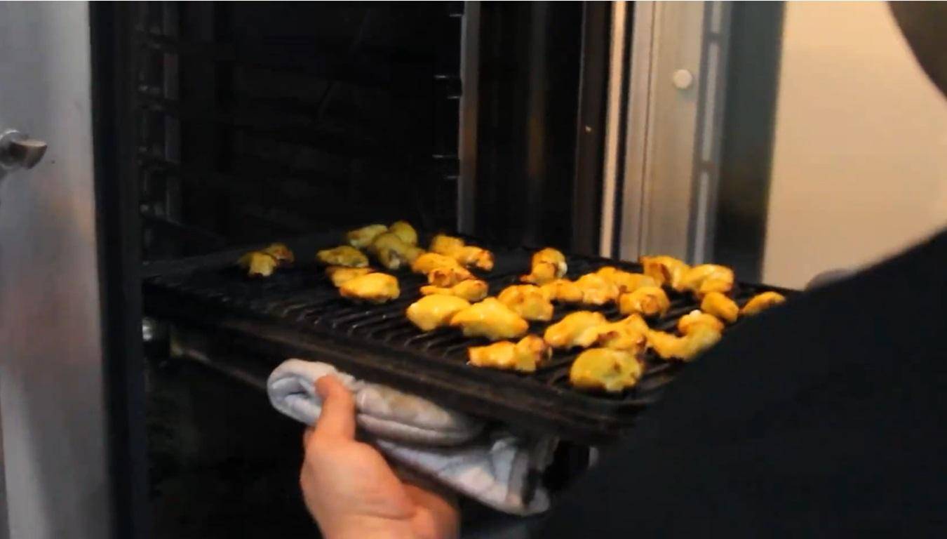 Halima prepares fried pastries on a grill for Suhoor and Iftar, cooking for the needy in Syria and Palestine, supported by crypto donations like BTC.