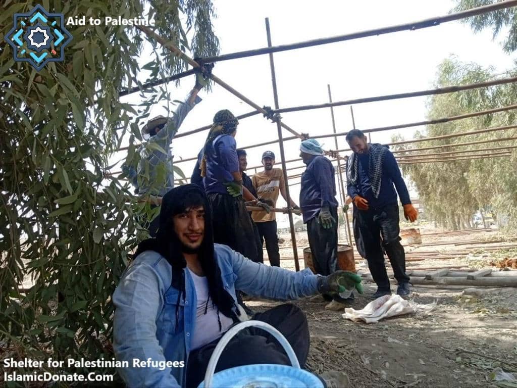 Shelter for Palestinian refugees construction aid, showing men building a basic structure. Blockchain donations of crypto like Solana help fund this vital relief.