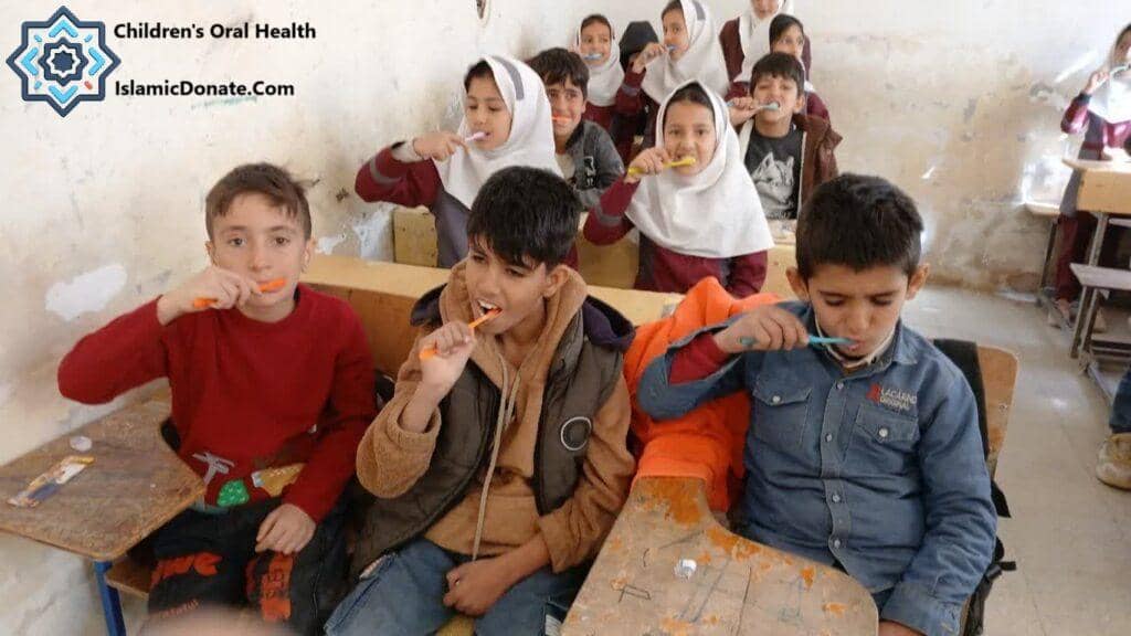 Children learning to brush their teeth, receiving dental kits and education for a cavity-free future. BTC donations provide essential oral care.
