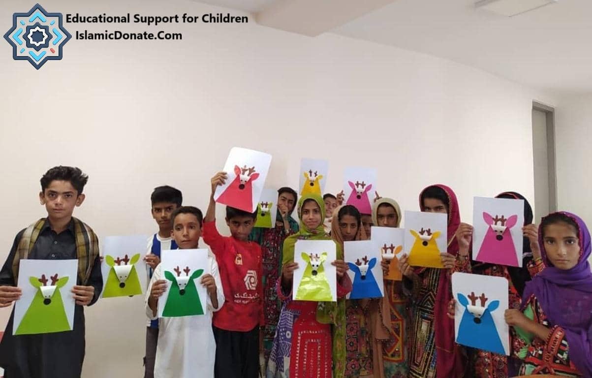 Children proudly display colorful paper crafts in an educational setting, symbolizing hope and empowerment through literacy and digital skills supported by crypto donations like BTC.