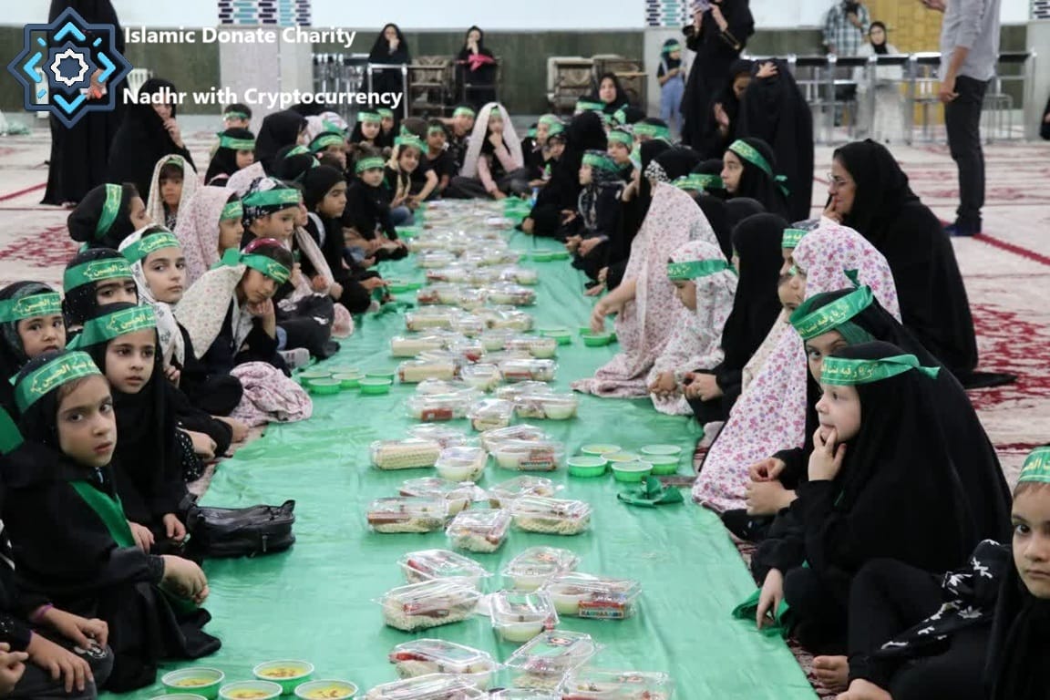 Imam Hussain Nazr food for children provided by USDT donations. Kids sit at a long green table with meals during a vow.
