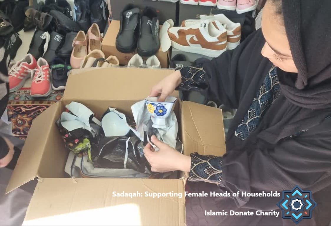 Sadaqah for Month of Safar charity boxes with SOL. Transcribe: Sadaqah: Supporting Female Heads of Households.