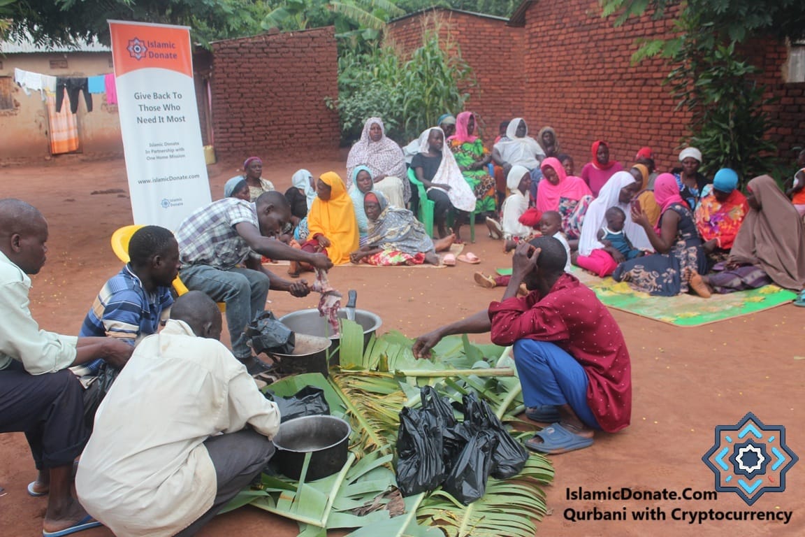 People preparing meat for distribution. Qurbani with cryptocurrency giving, bringing meat and mercy to families, uses SOL for transparent, secure donations.