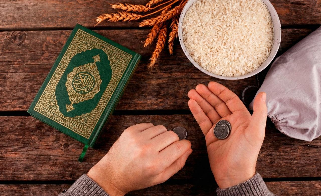Khums year calculation with Quran, rice, coins, and a donation bag. Pay Khums on surplus income for purified wealth. Donate via crypto like USDT.