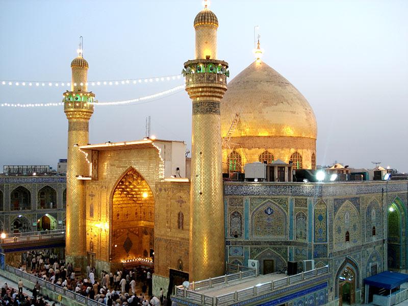 A stunning gold-domed mosque with minarets, a symbol of Islamic heritage, reflecting the principles of charitable giving and leadership embodied by Imam Ali. Donation via cryptocurrency like BTC honors this legacy for swift and transparent aid.