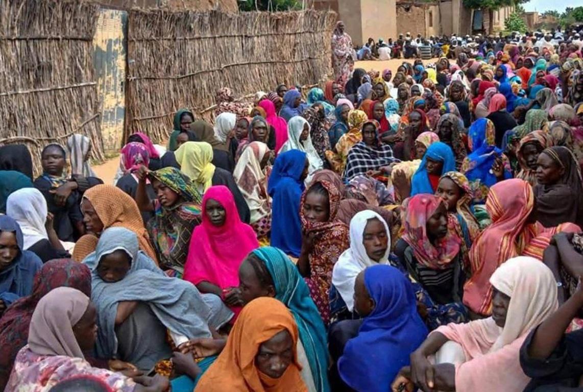 Somali climate crisis relief aid for women using SOL. Humanitarian assistance supports sustainable solutions for families.