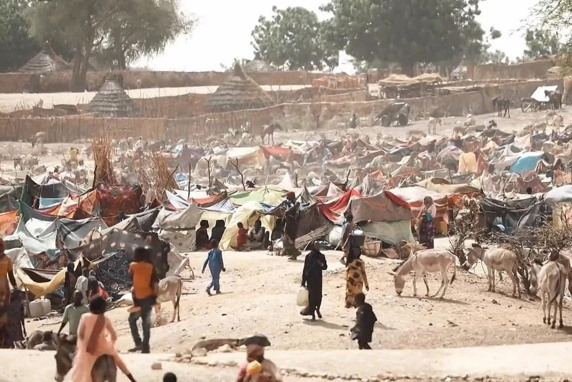 Somalia climate crisis victims in drought relief camp receive emergency aid through XRP crypto donations and water projects.