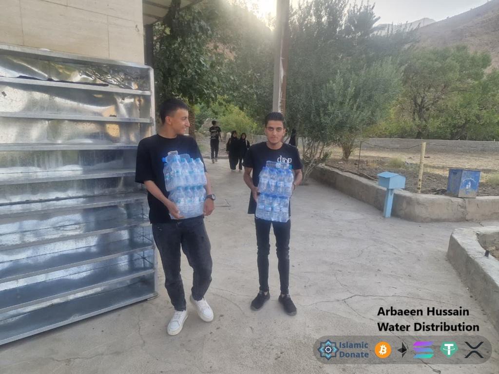 Arbaeen Pilgrimage water distribution funded by USDT to support travelers in Karbala during their sacred religious journey.