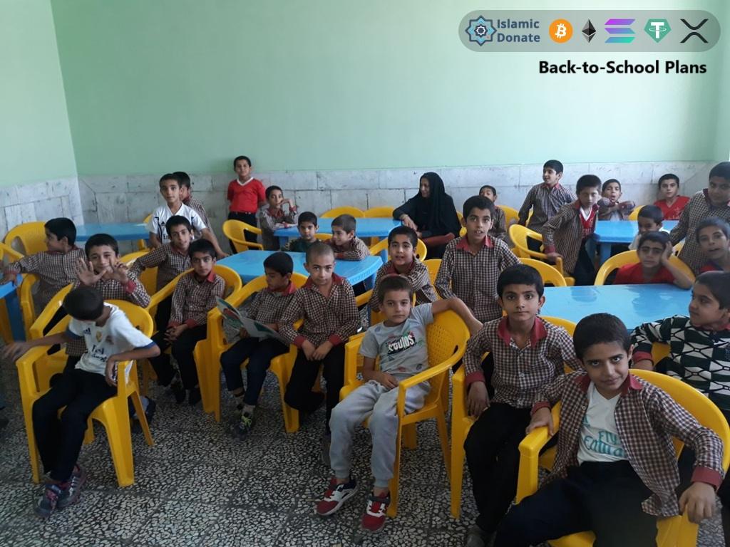 Literacy training students in a classroom for Back to School Plans supported by Stablecoin donations and Islamic Donate Charity.