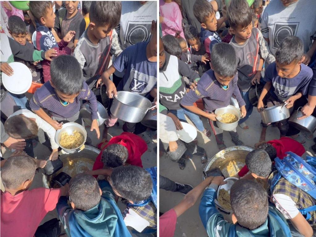 Palestinian children gather to receive food aid from a large pot using Solana for humanitarian relief.