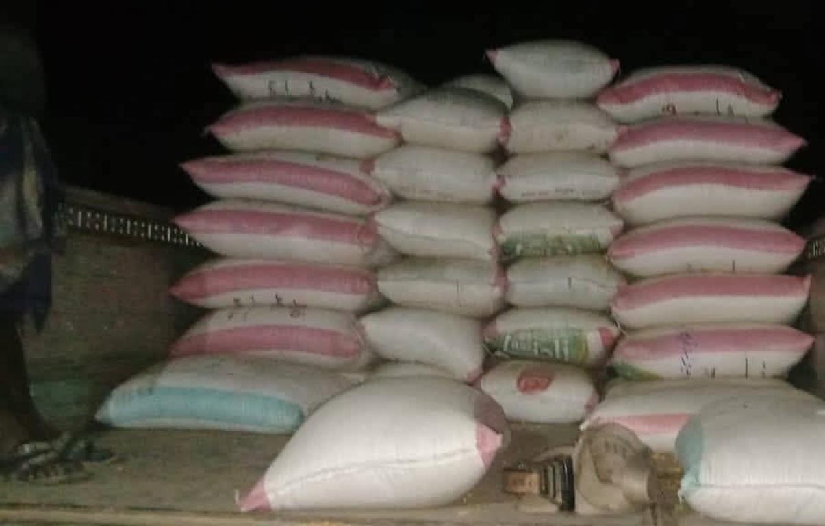 Nighttime flour transfers. Humanitarian aid flour arrive in Gaza to combat hunger via USDC donations for families facing severe food shortages.