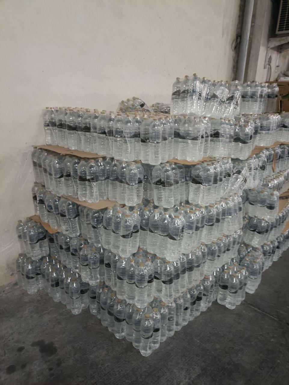 hand-carrying clean drinking water to families in Khan Yunis, Gaza. Donations via crypto like LTC provide essential water.
