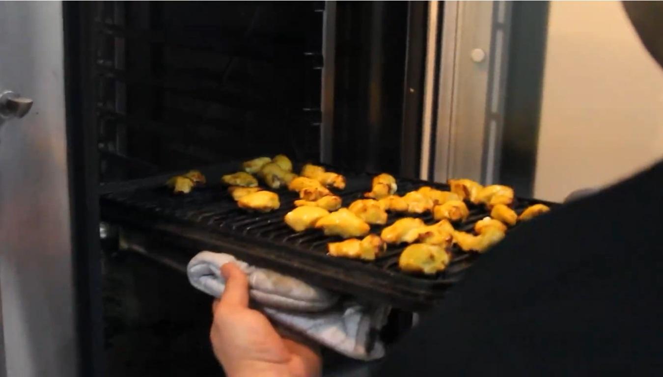 Halima prepares fried pastries on a grill for Suhoor and Iftar, cooking for the needy in Syria and Palestine, supported by crypto donations like BTC.