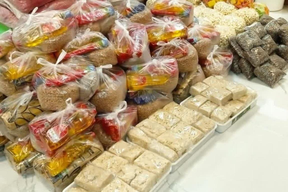 Zakat food aid packages for Palestine refugees funded via PayPal USD donations including rice and bread supplies for families