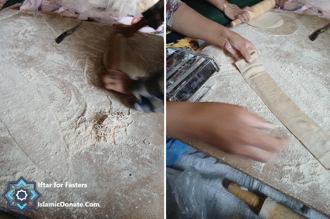 Hands making traditional dried noodles from flour, prepared with Ethereum donations for Ramadan 2026 sustenance.