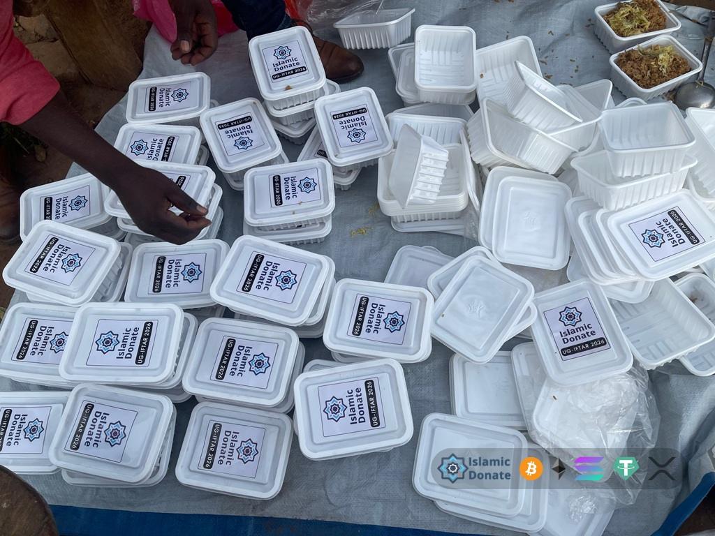 Staff pack Iftar food using TRX to provide secure silent giving to refugees. Crypto Zakat to Charity Wallet Directly.