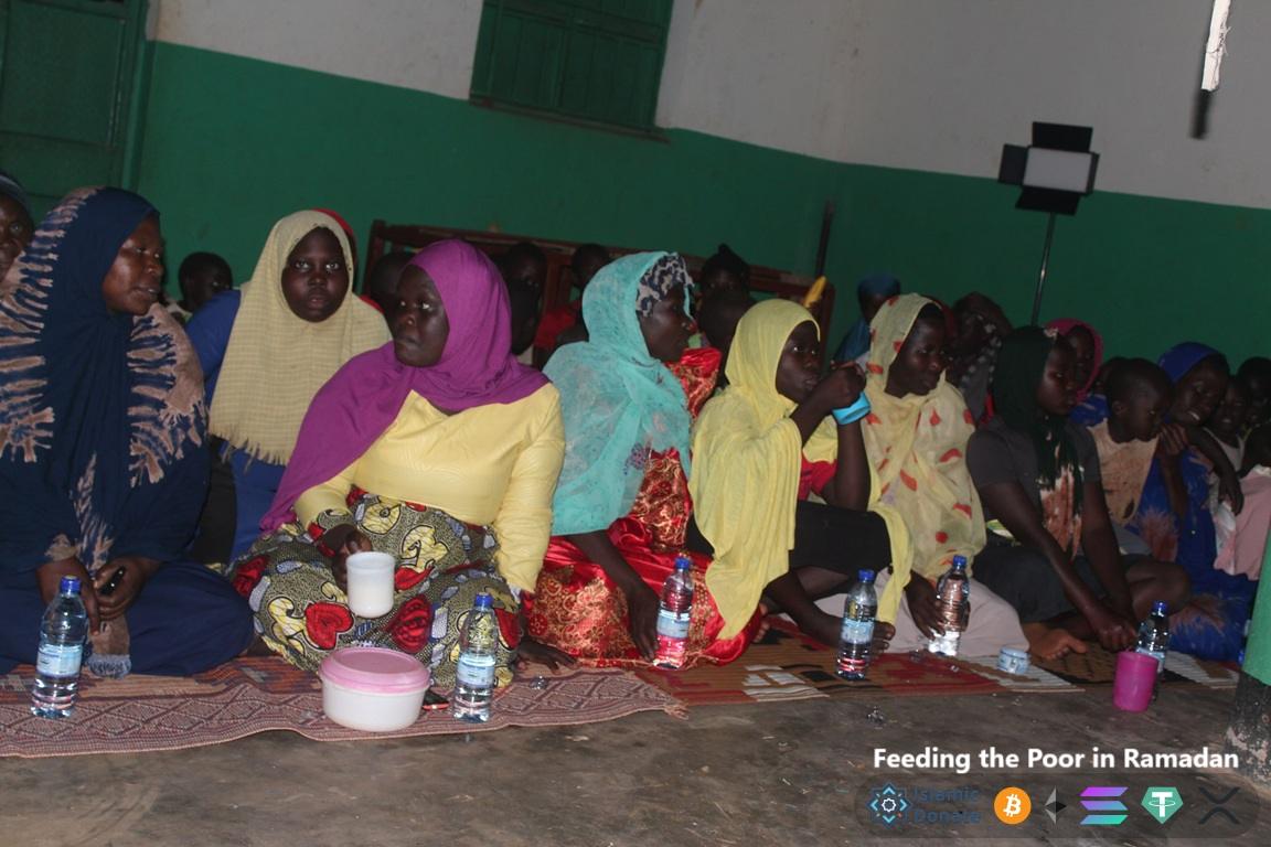 Feeds needy women in Ramadan using USDC. Feeding the Poor in Ramadan text displayed on image.