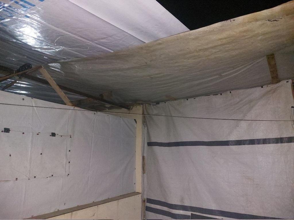Refugee camp tent shelter requires urgent medical aid and sanitation support funded by Bitcoin charity donations