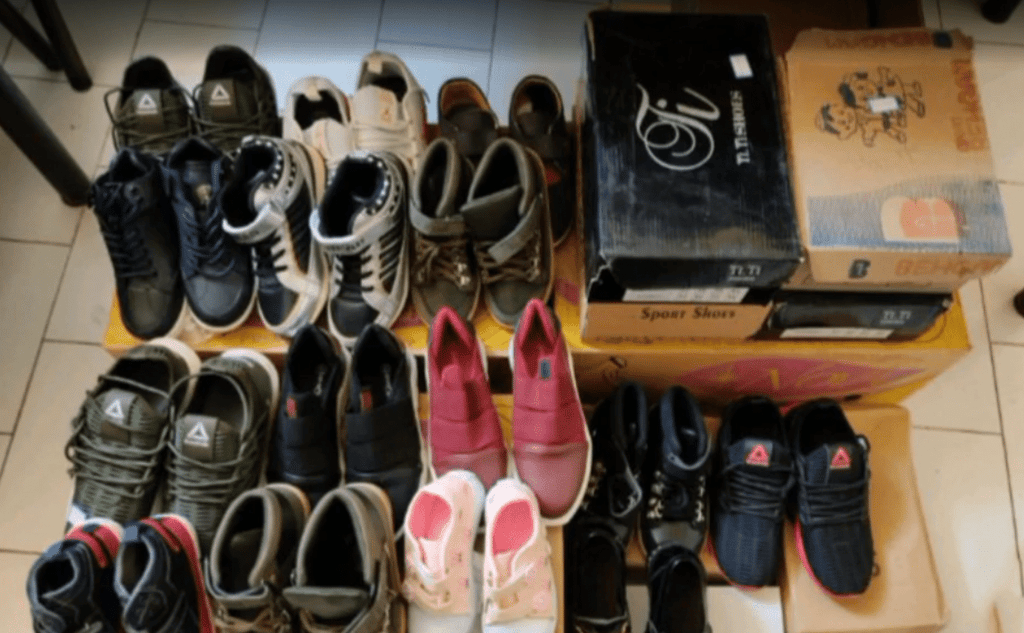 Assortment of new shoes for children, symbolizing crypto-funded educational aid and back-to-school support, sponsored by a generous donor using ETH.