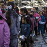 Children in war-torn Syria wait with pots for meals, symbolizing hope and resilience, with donations of BTC enabling this relief.