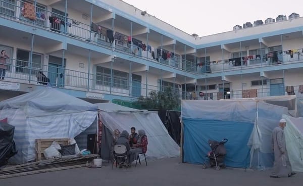 Aid to Gaza children receiving food and water delivered via crypto donations, facing new dangers as aid trucks are attacked; people live in makeshift shelters in Gaza.