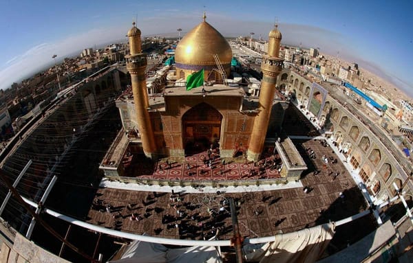 Aerial view of Imam Ali Holy Shrine courtyard with pilgrims, a virtual tour experience highlighting Islamic charity donations via ETH.