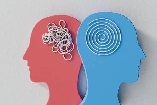 Two profiles representing mental states: one red with a tangled mess of white lines, the other blue with a neat spiral, symbolizing the journey from distress to peace in holistic well-being, with support from crypto donations like Bitcoin.